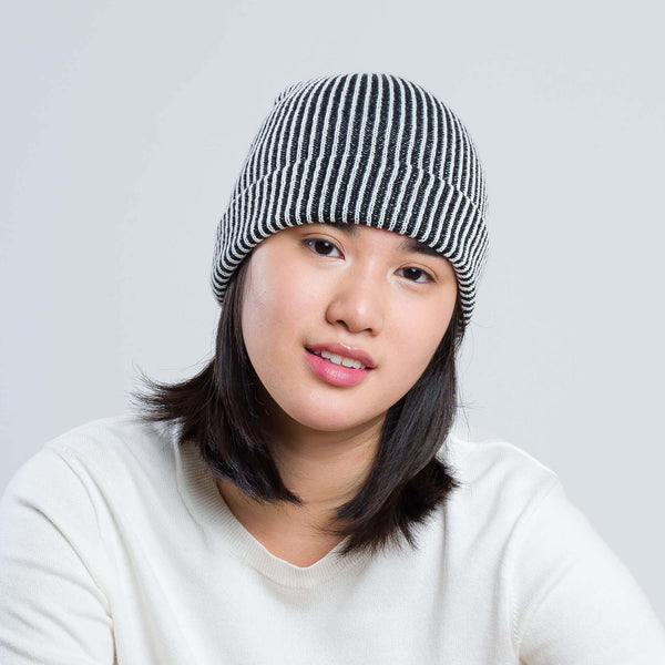 white and black beanie
